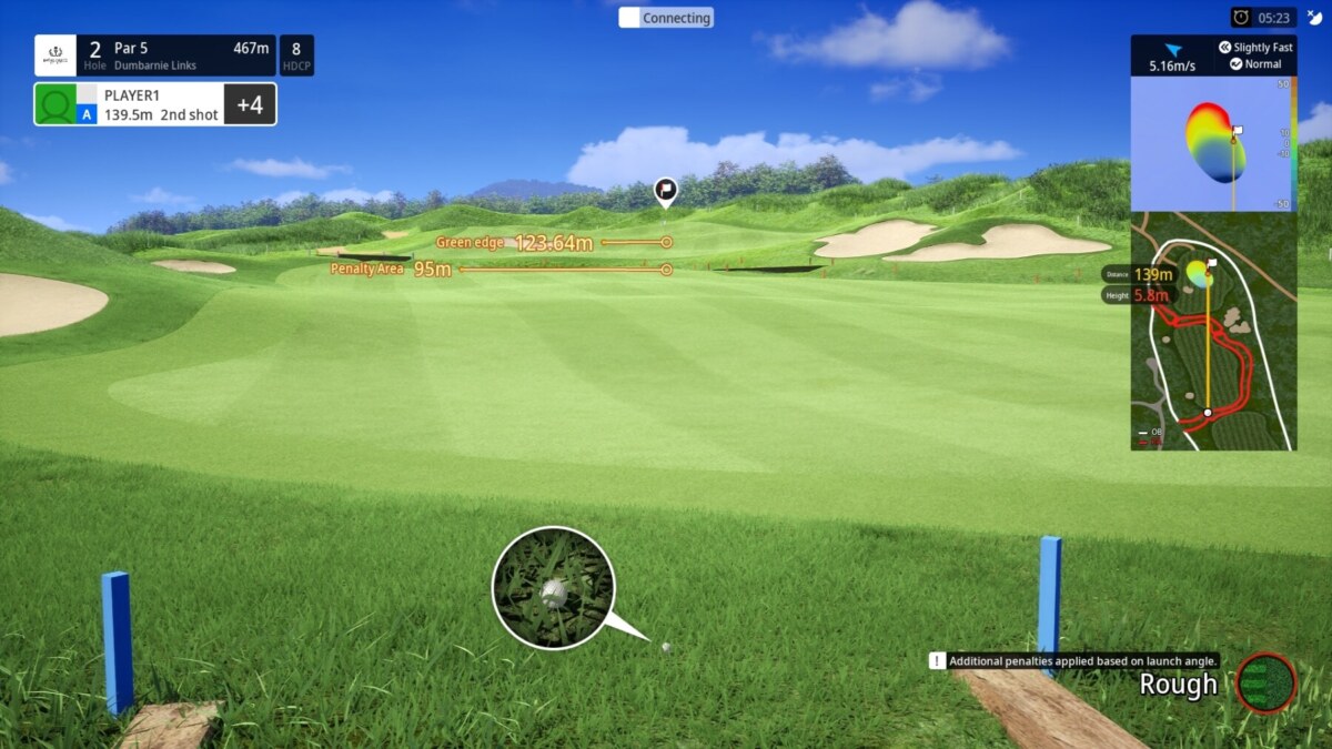 On the golf simulator screen there is a ball just before the fairway in the rough. There is a pointer to show where the ball landed.
